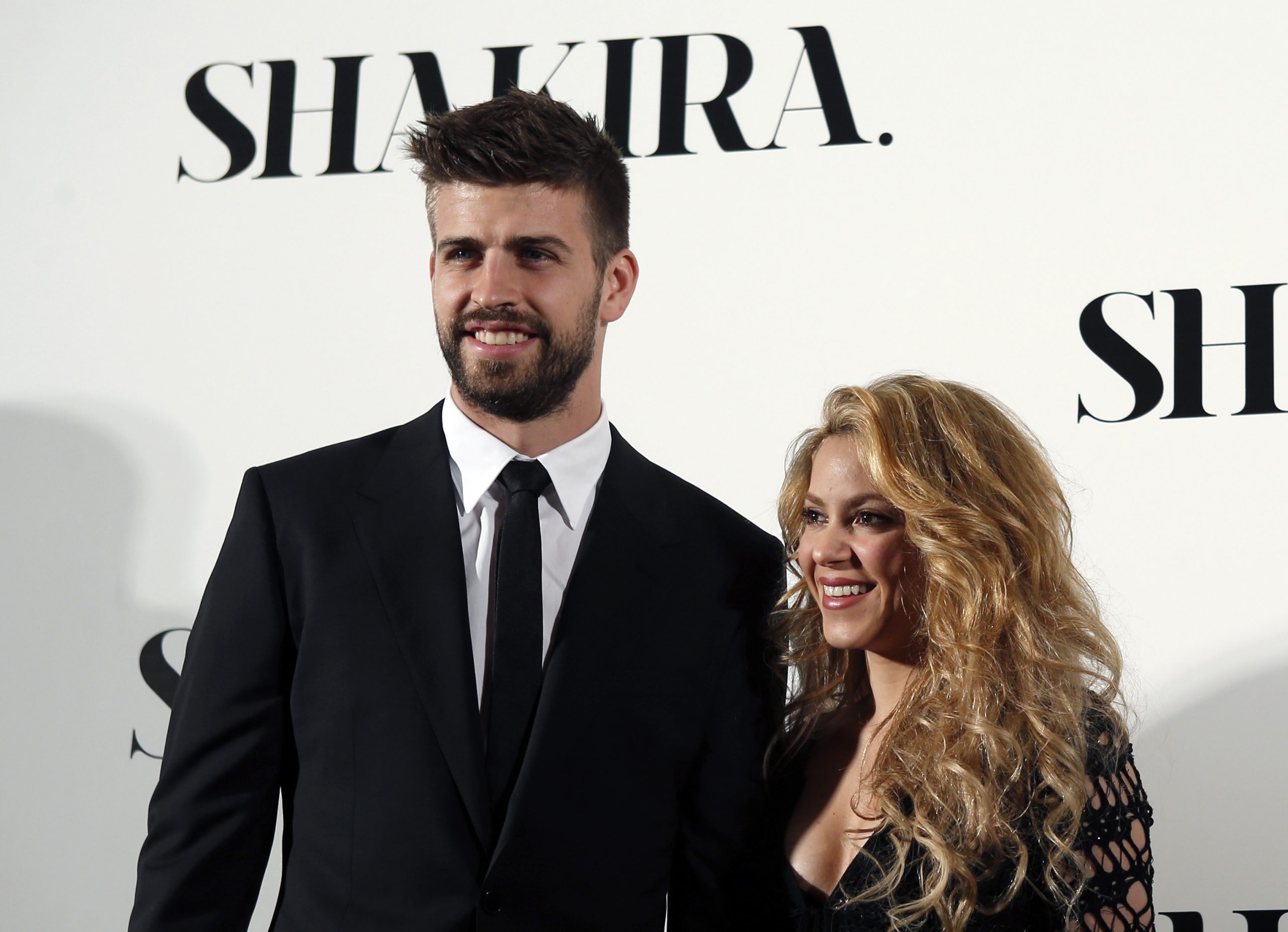 Colombian singer Shakira and FC Barcelona's soccer player Gerard Pique pose during a photocall presenting her new album 
